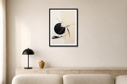 Black Orbit Abstract Print print displayed in a living room matched to its warm ivory, black, ochre palette