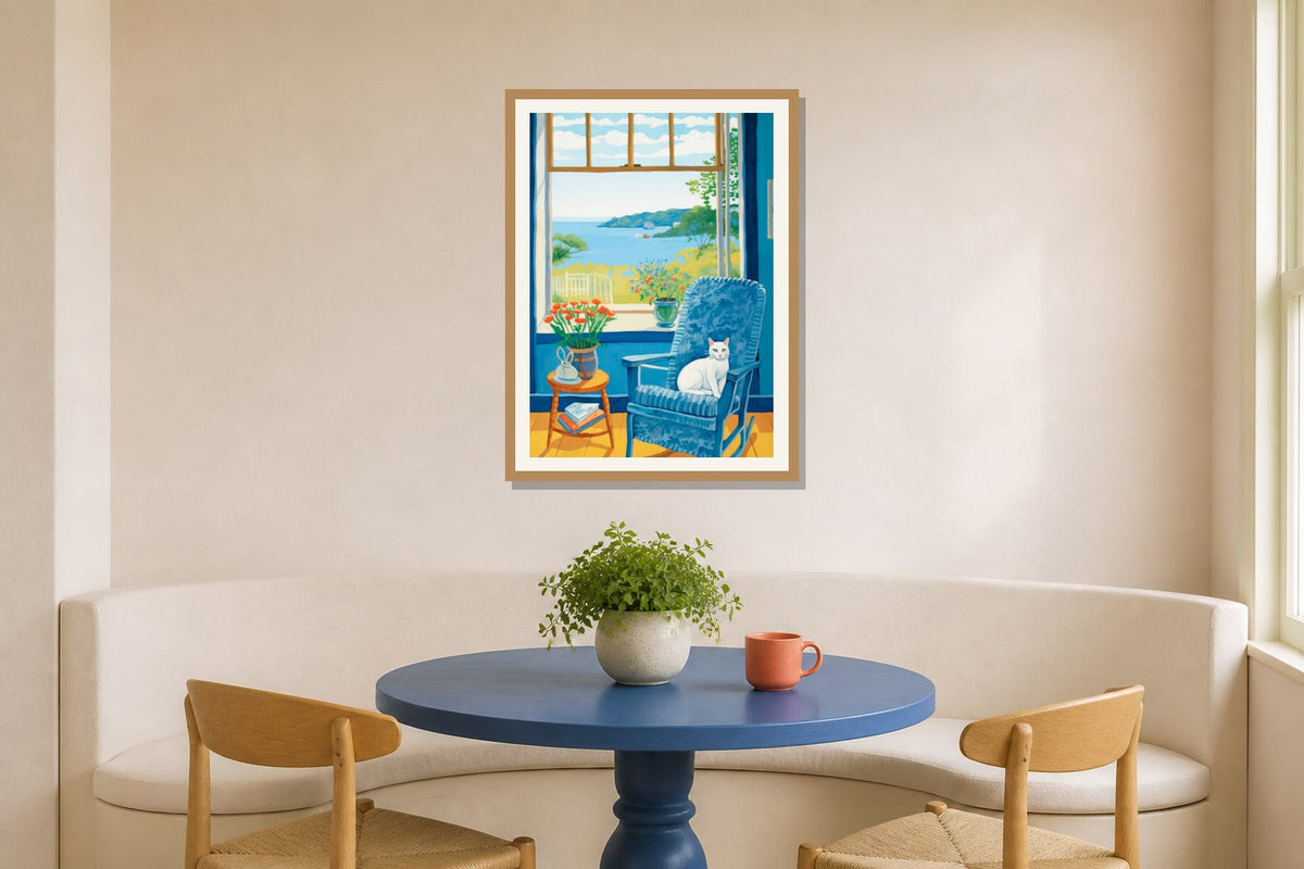 Blue Window Cat Print print displayed in a breakfast nook matched to its cobalt blue, sunny yellow, coral palette