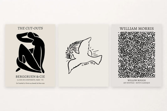 Seated silhouette, flying-bird outline, and patterned willow leaves.