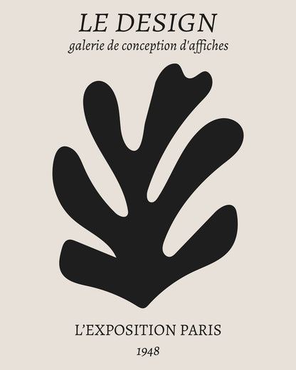 A larger leaf-like form paired with LE DESIGN lettering.