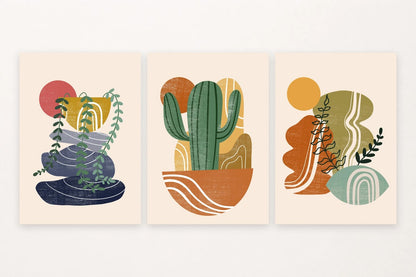 Three botanical prints show blue gray stones, a green cactus, and sage forms beneath suns.