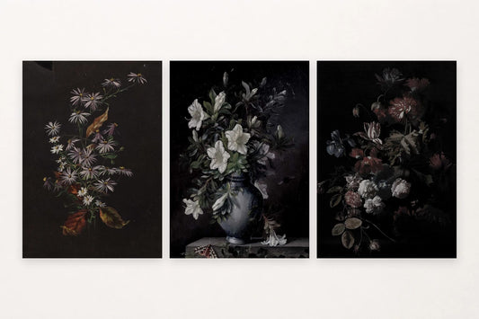 Three floral prints show small dark-ground blooms, a gray-blue vase, and a full bouquet.