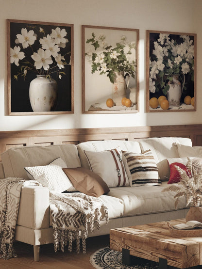 The flower-and-vase triptych arranged together on a wall; frames are not included.