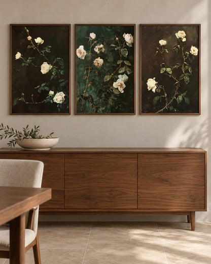 The dark-ground rose triptych shown together on a wall; frames are not included.