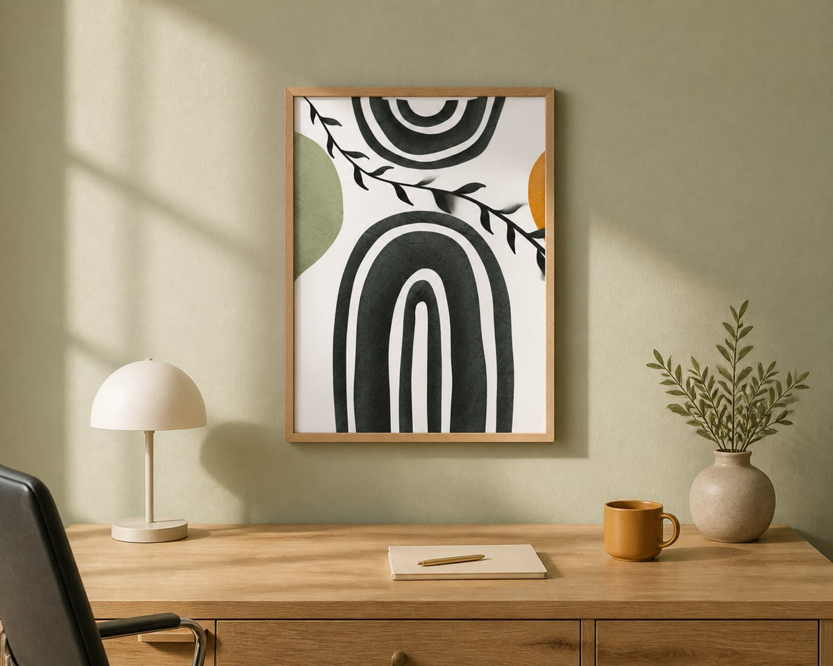 Charcoal Arch Botanical Print above a natural oak desk in a pale sage home office