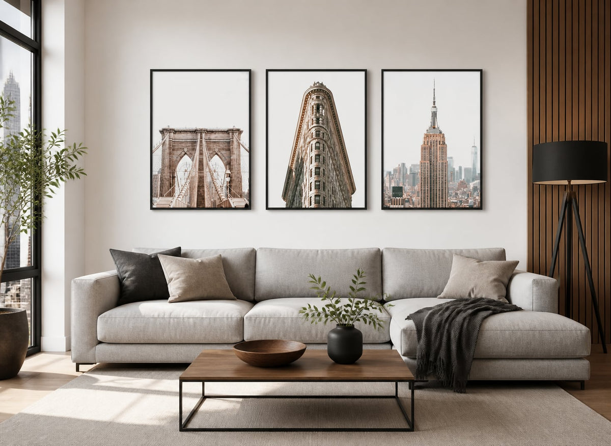 Architectural city triptych in a gray, walnut, and black living room