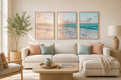 Pastel coastal triptych in an ivory living room with peach and turquoise accents