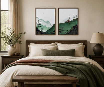 Green hills and red-cabin pair above an ivory bed with forest-green textiles