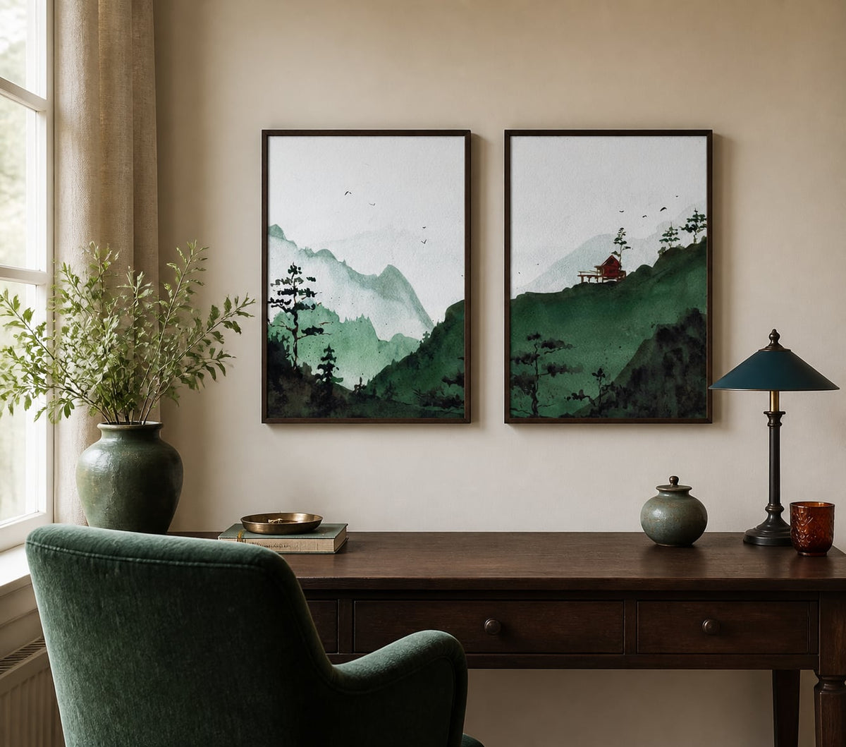 Green hills and red-cabin pair above a dark-walnut desk in a warm study