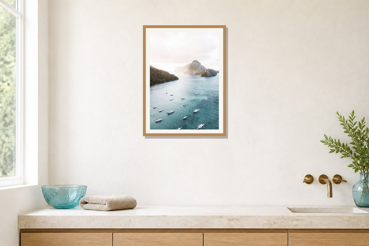 Island Bay Aerial Print print displayed in a bathroom matched to its turquoise, aqua, white palette