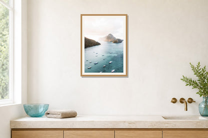 Island Bay Aerial Print print displayed in a bathroom matched to its turquoise, aqua, white palette