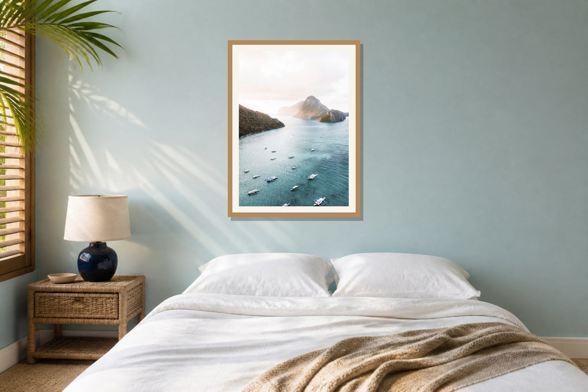 Island Bay Aerial Print print displayed in a bedroom matched to its turquoise, aqua, white palette