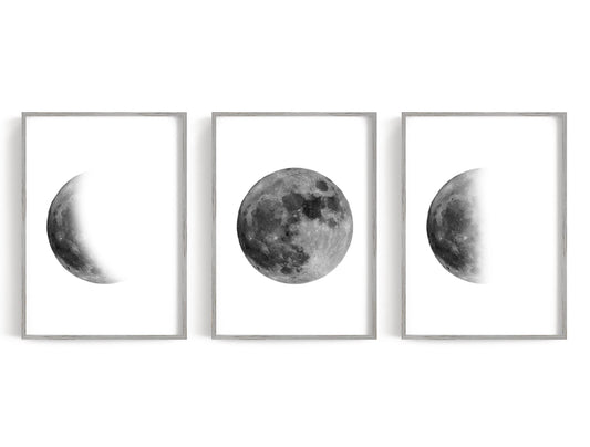 Monochrome moon phases with a full moon centered between two partial phases
