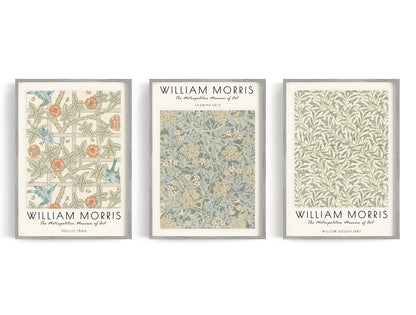 Three botanical pattern posters in cream, sage, orange, and blue