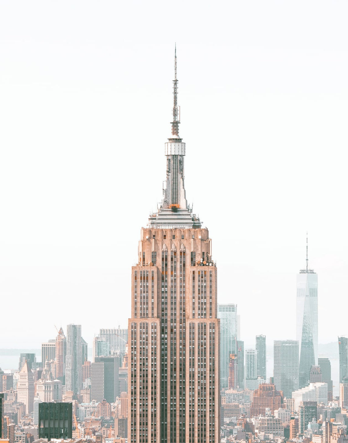 Black-and-white skyline with a prominent central tower