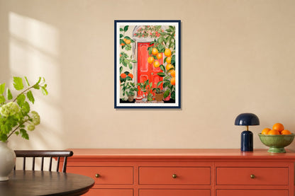 Orange Grove Doorway Print print displayed in a kitchen matched to its coral orange, leaf green, navy palette