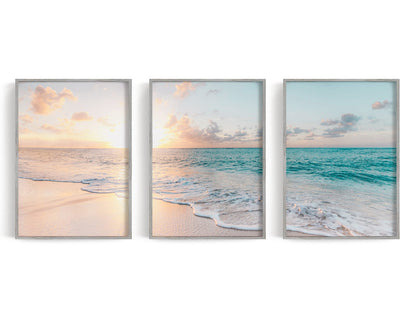 Three pastel shoreline prints in peach, turquoise, and blue displayed together