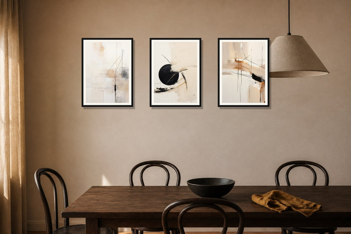 Quiet Geometry Abstract Trio trio displayed in a dining room matched to its warm ivory, black, ochre palette