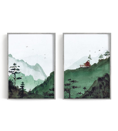Two green mountain prints with a windswept tree and red cabin