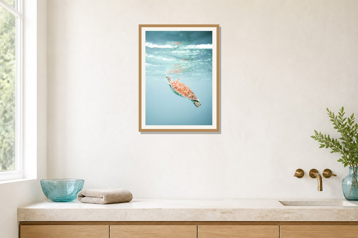 Sea Turtle Water Print print displayed in a bathroom matched to its turquoise, aqua, white palette