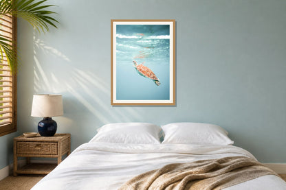 Sea Turtle Water Print print displayed in a bedroom matched to its turquoise, aqua, white palette
