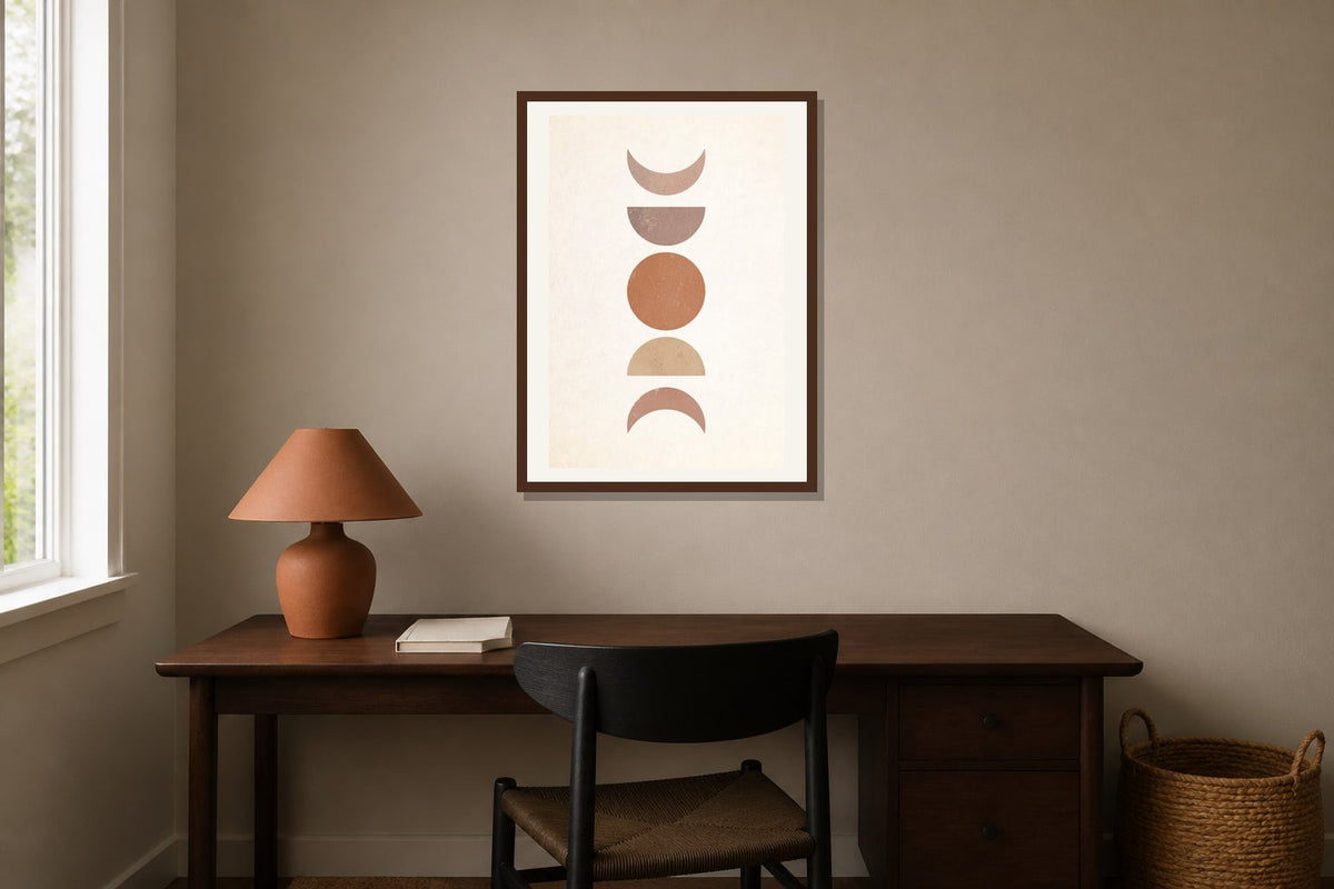 Stacked Moon Phases Print print displayed in a home office matched to its terracotta, sand, black palette