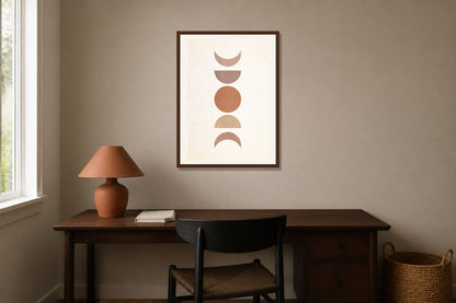 Stacked Moon Phases Print print displayed in a home office matched to its terracotta, sand, black palette