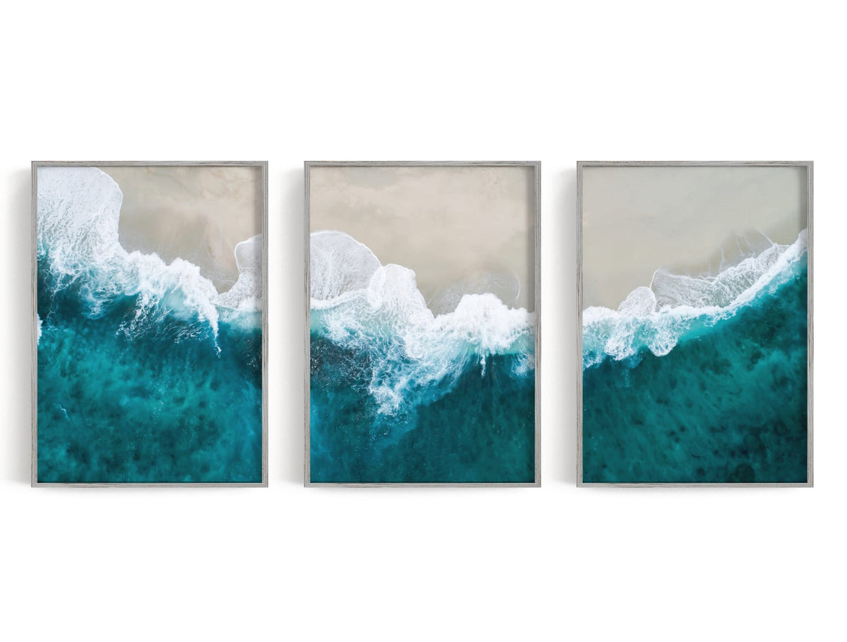 Three overhead shoreline prints in turquoise, white, and pale sand