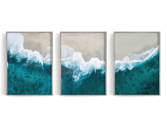 Three overhead shoreline prints in turquoise, white, and pale sand