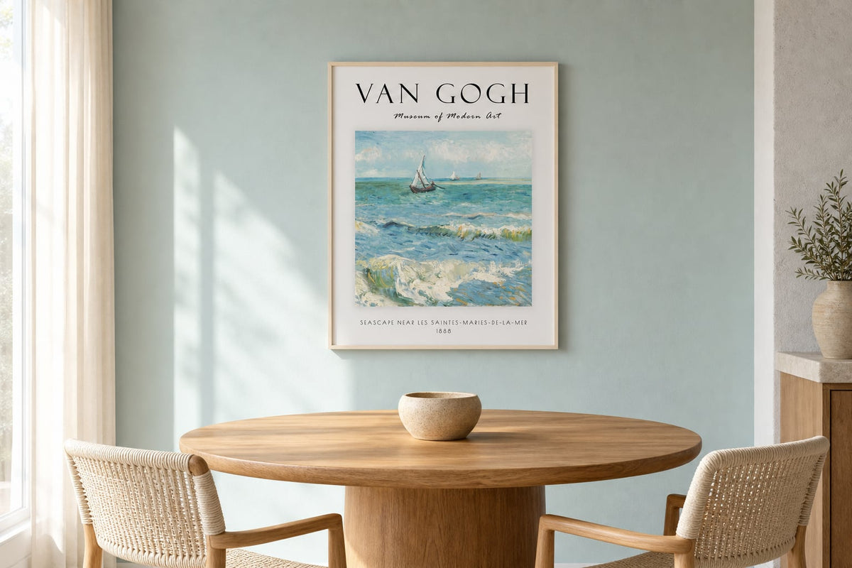 Van Gogh Seascape Print above a warm oak table in a pale sea glass dining nook