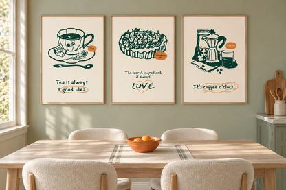 Three food prints hang over a dining table in a light room.