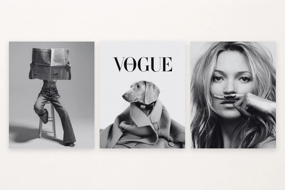 A newspaper reader, a dog under VOGUE PARIS, and a portrait with a drawn mustache.