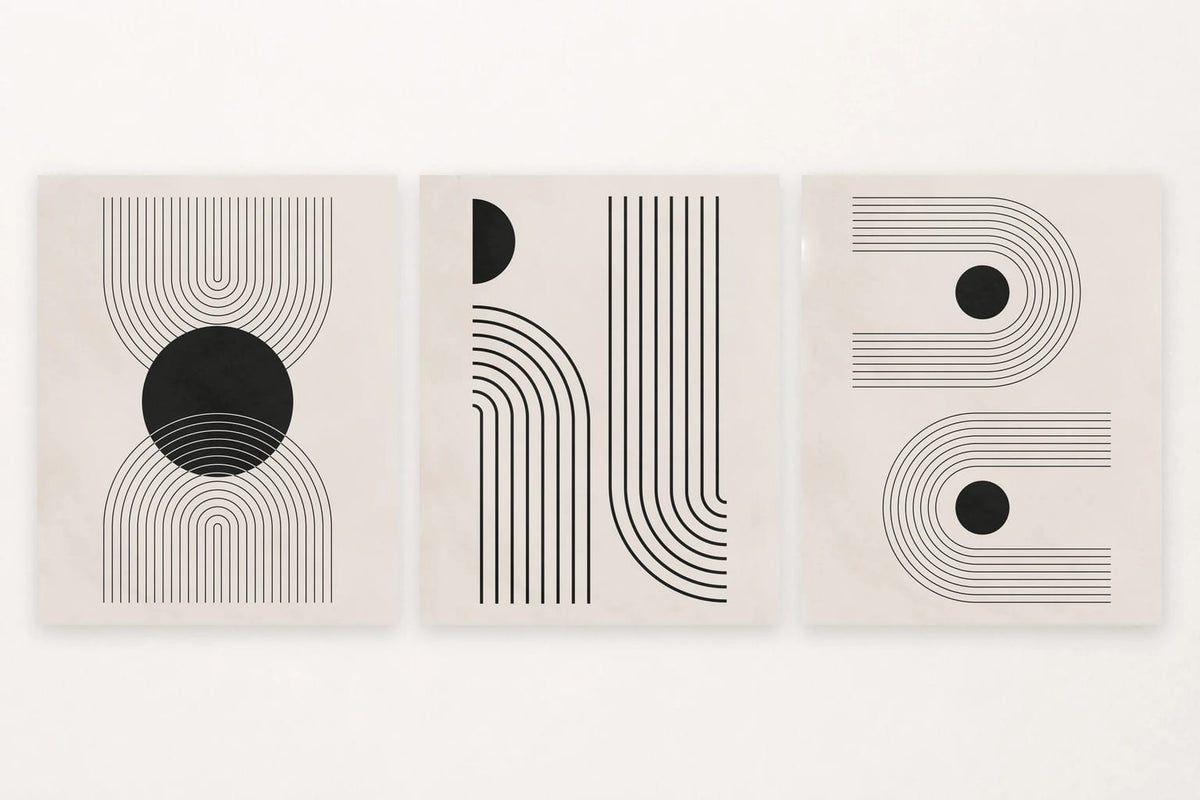 Three abstract prints vary circles, arcs, and lines across open black-and-white compositions.