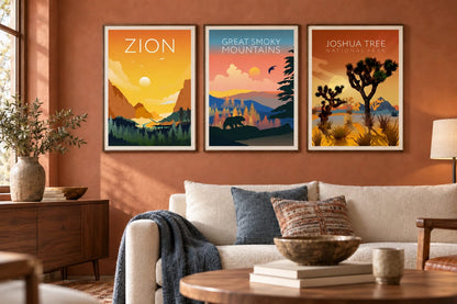 Three landscape prints hang above a light sofa in a terracotta living room.