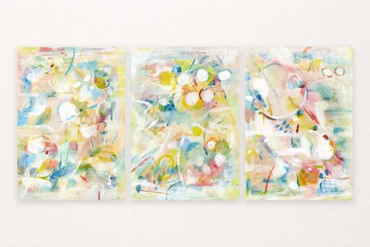 Soft circles, loose strokes, and salmon shapes give this trio an airy abstract rhythm.