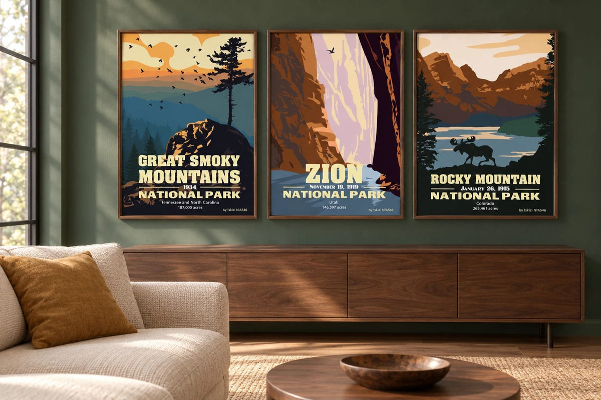 Mountain triptych over a light sofa against an olive wall in a living room.