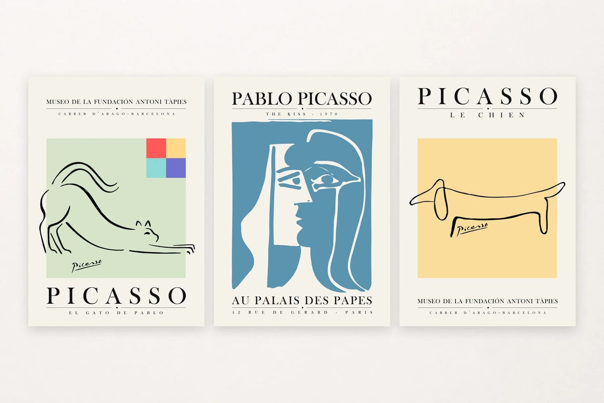 Three graphic prints with a cat, two faces, and a long dog.