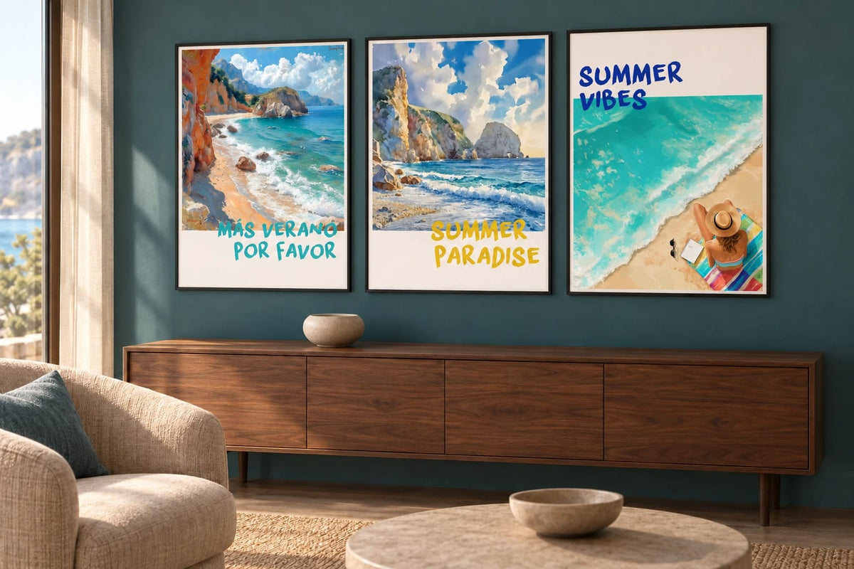Three shore scenes above a walnut console against a deep blue-green wall.