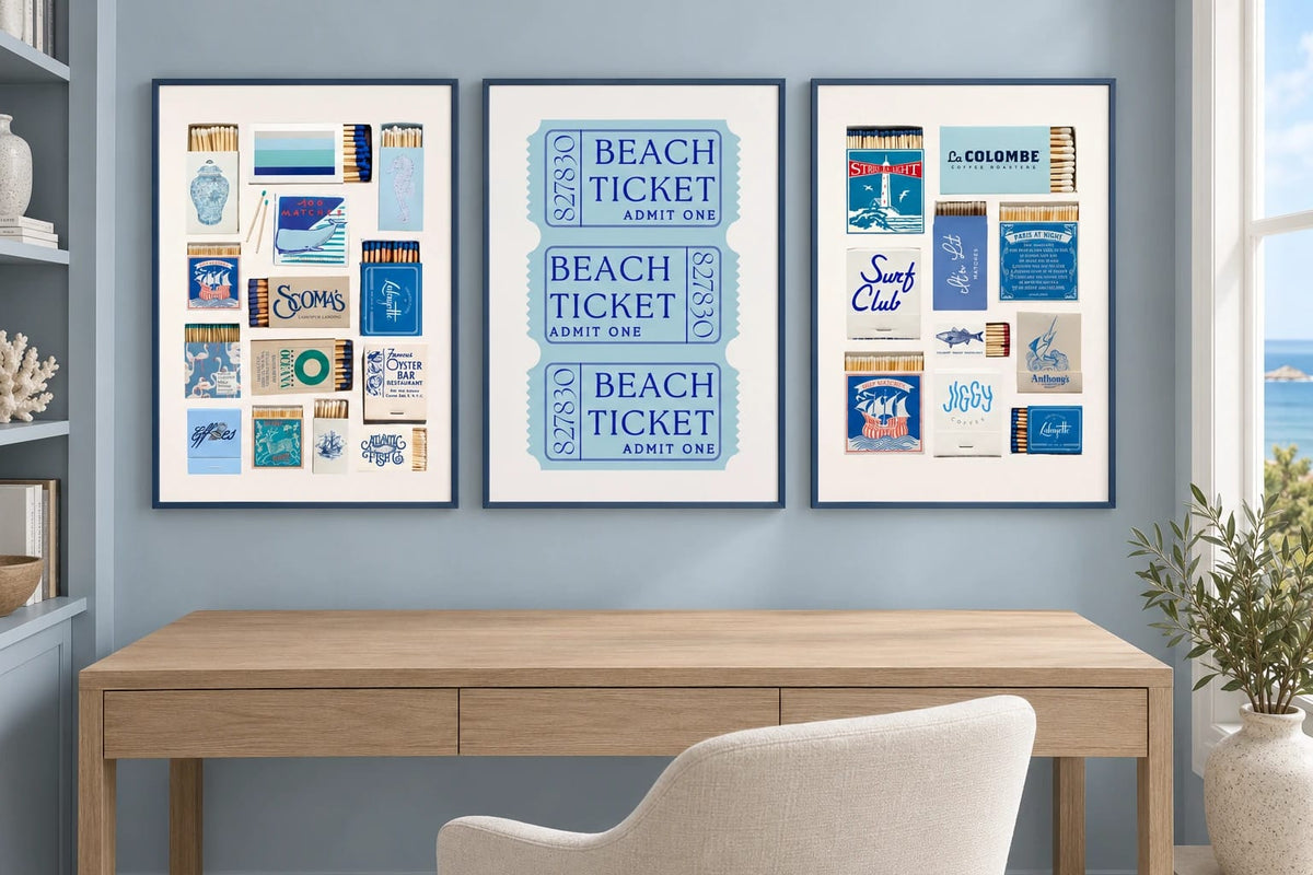 Blue coastal collage triptych above a desk.