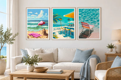 Beach-themed prints displayed above a sofa with blue textiles.