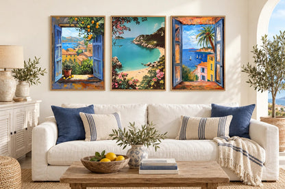Coastal prints above a sofa with blue pillows.