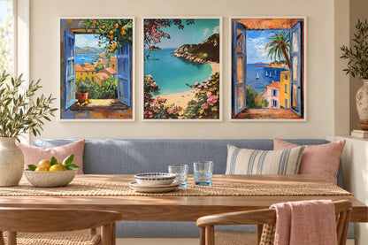 Three cove prints above a blue bench beside a wood dining table.