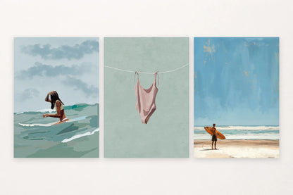 Coastal set with a swimsuit portrait, hanging suit, and surfer with an orange board.