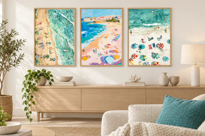 Beach prints above an oak dresser in a light living room.