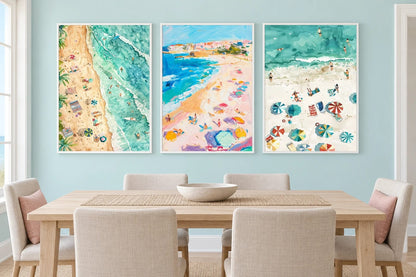 Three colorful coastal prints in a blue dining room.