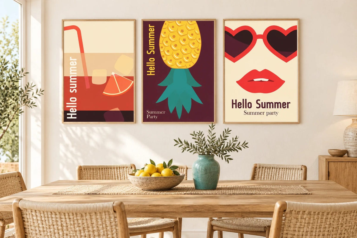 Summer prints above a dining table beside a turquoise vase.