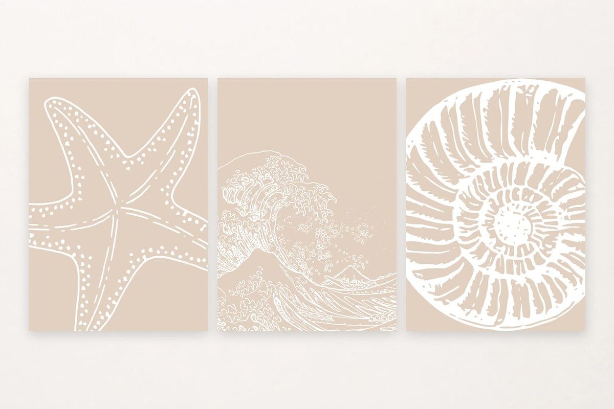 Three beige prints with white sea star, breaking wave, and spiral shell outlines.