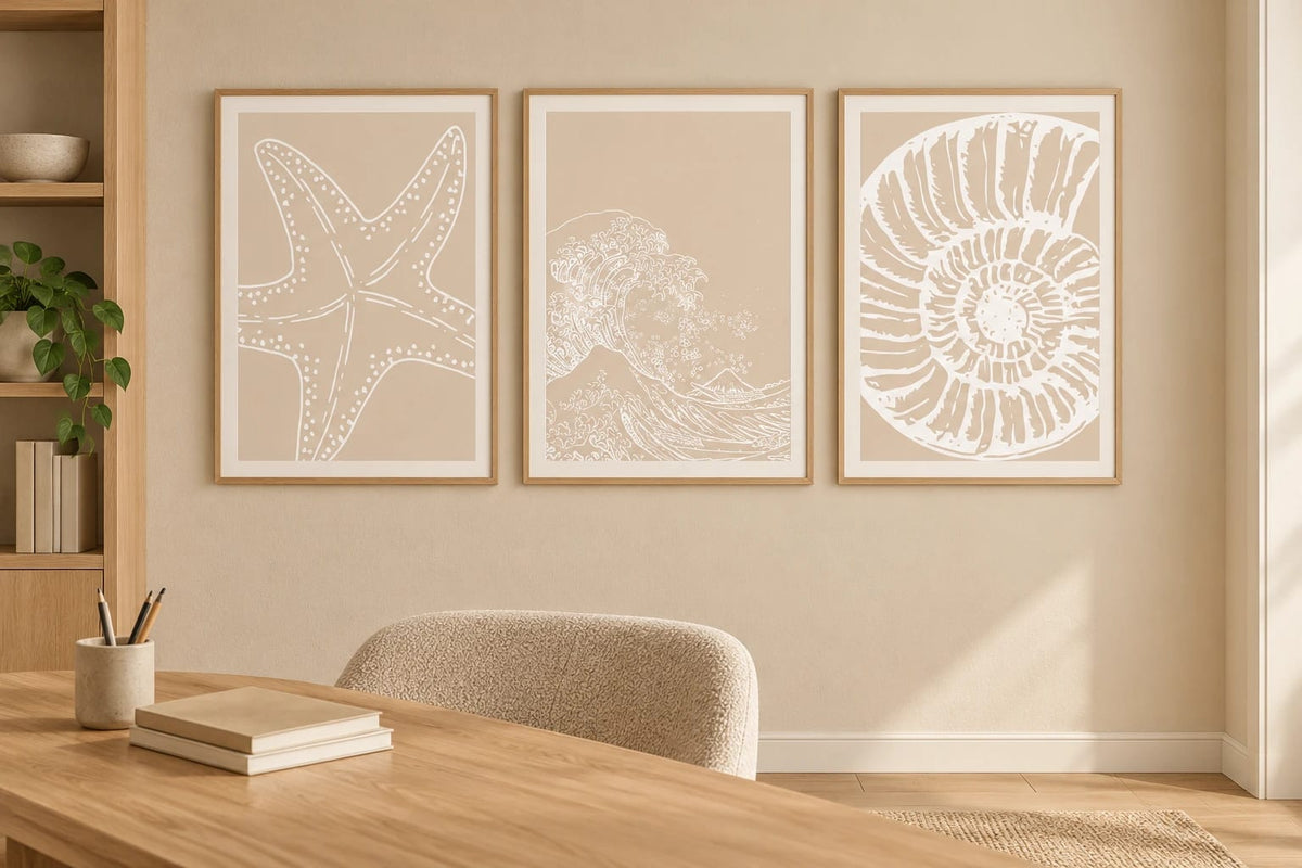 Minimal sea prints in a light office.