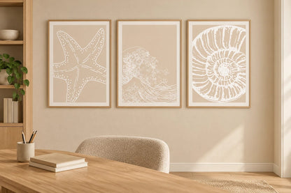 Minimal sea prints in a light office.