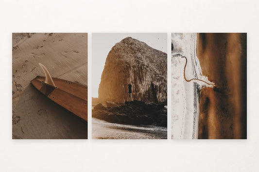 Three beach studies with a surfboard, a person by rock, and amber sand.